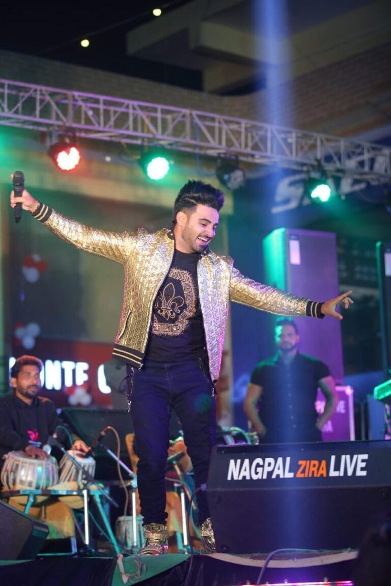 Resham Singh Anmol performing live on stage at Nagpal Zira event Punjabi music concert